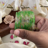 Vriksham Dual Tone Rain Drop Glass Bangle-Off White & Parrot Green-Set of 12-G15814